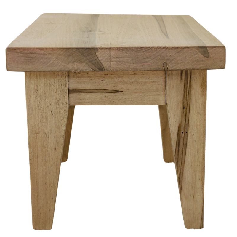 Side image of the step stool featuring the tapered legs.