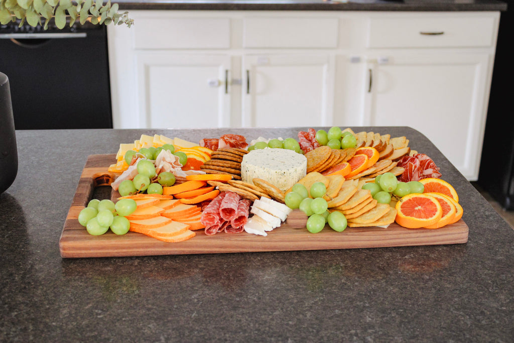 Close up image of the styled wooden charcutier board.