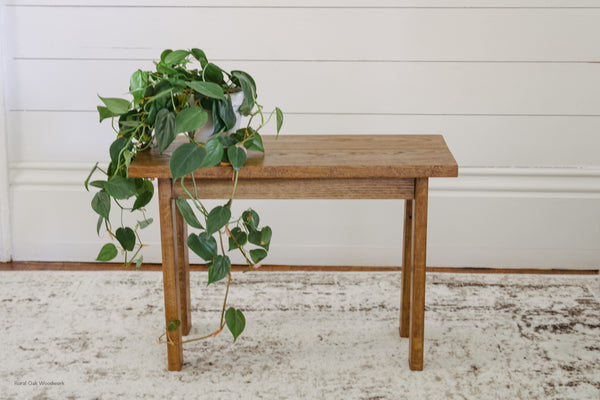 Mini Oak bench styled with a plant in the color provincial.
