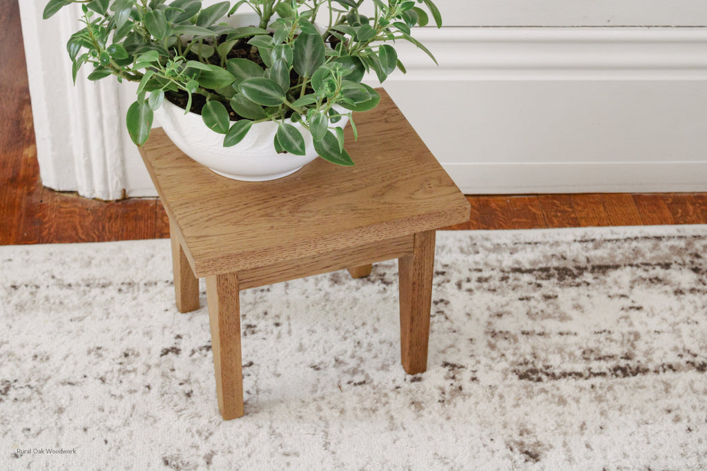 Image shot from the top showing the top of the oak step stool.